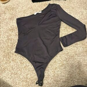 One armed gray body suit. Only worn once. Size S.